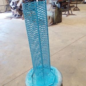 Handmade welded out steel toilet paper stand, light blue.